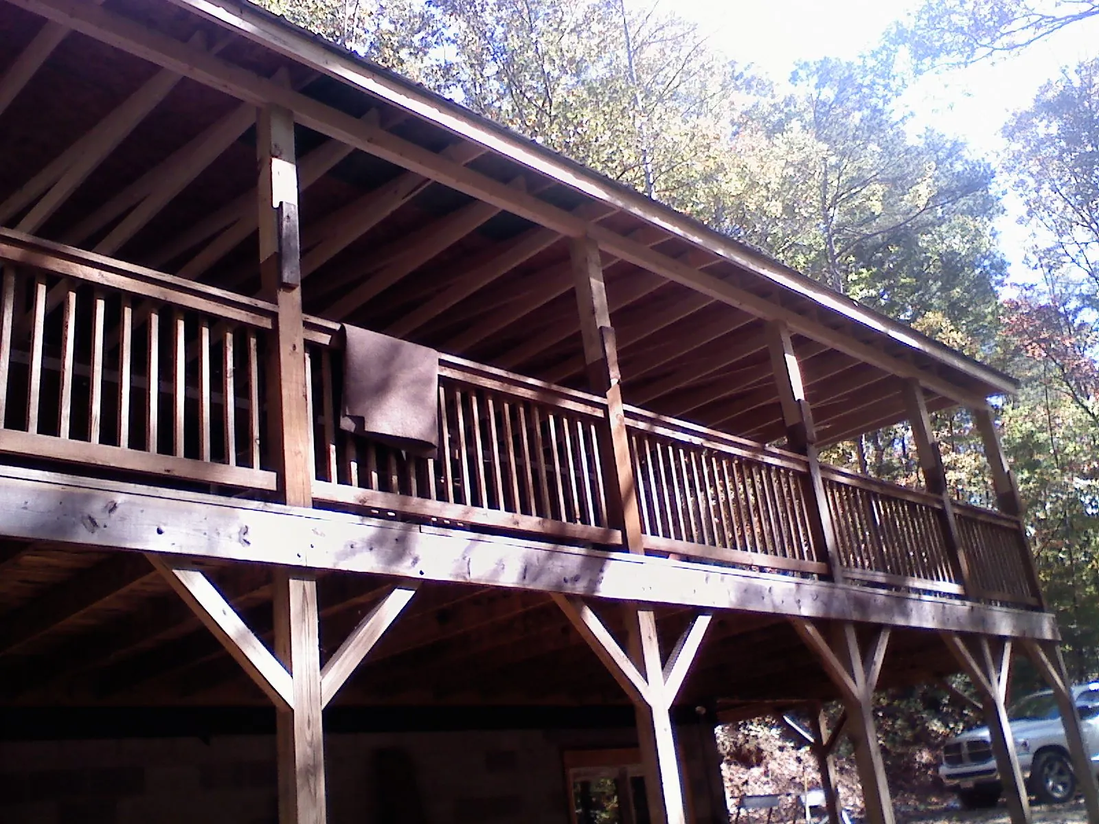 Timber framing under a new elevated porch and deck — Roof Leak Repair in Murdock by Roofing Brothers